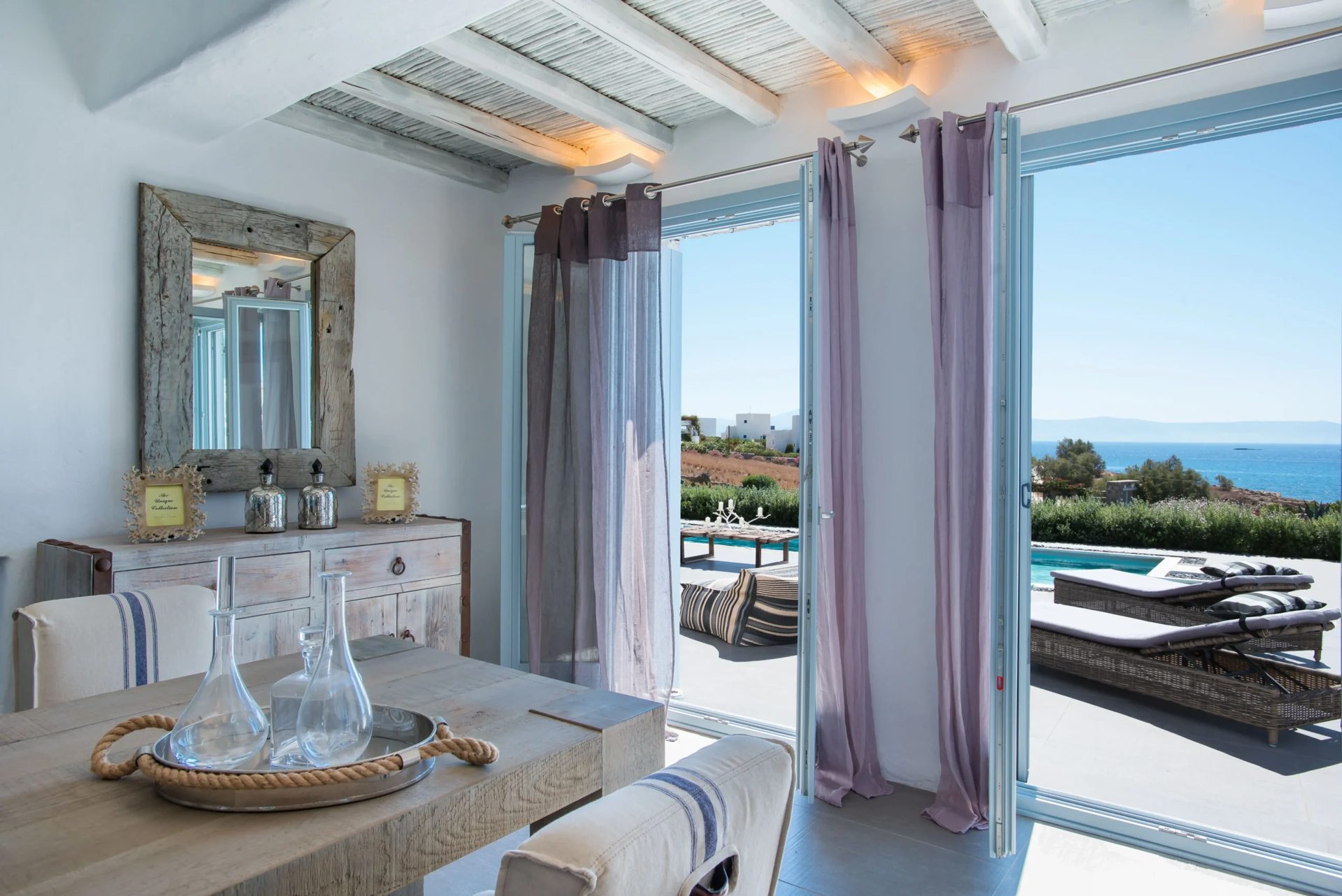 Villa living room opening to the pool